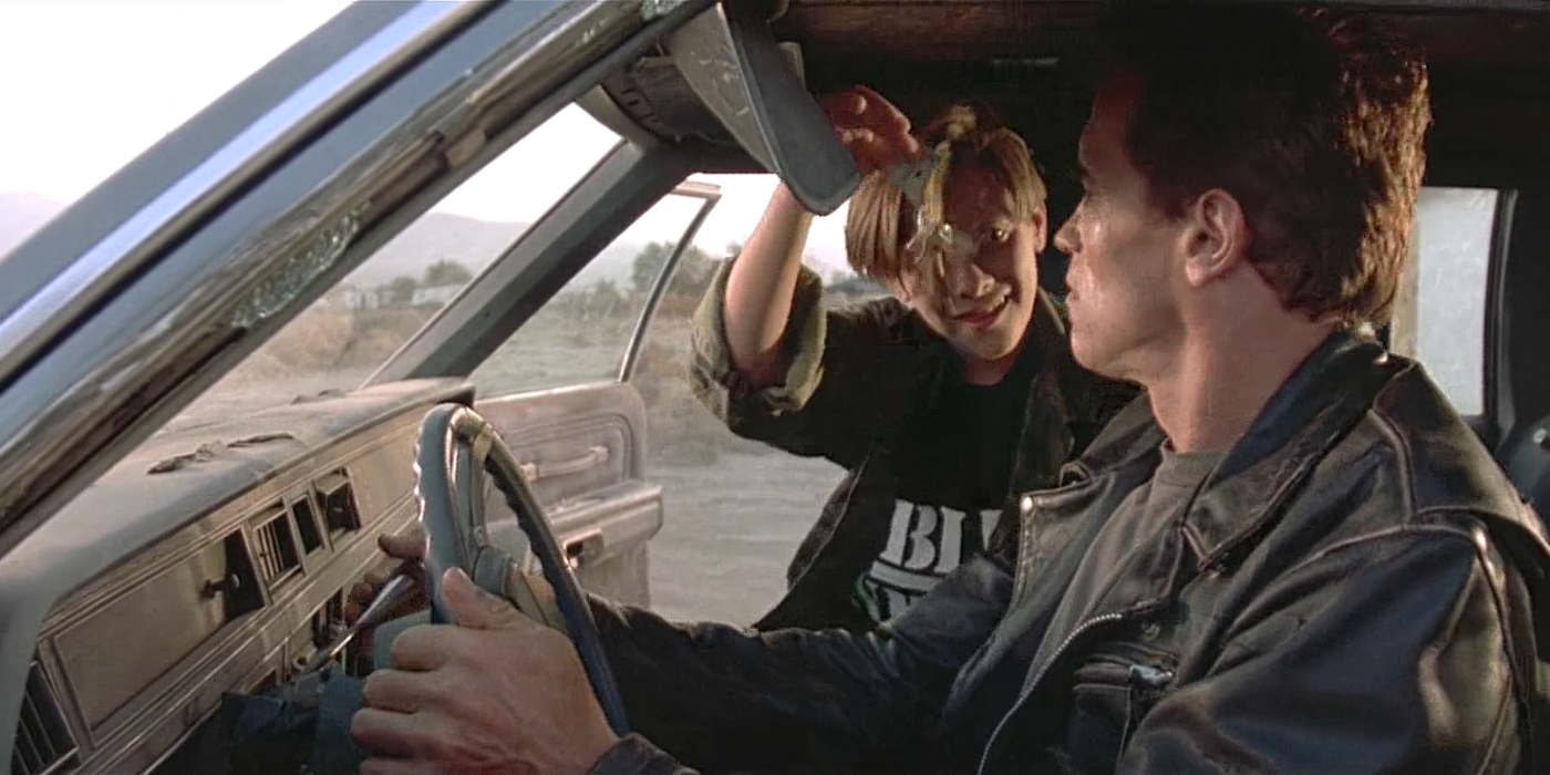 Characters from The Terminator finding keys in a car sun visor 