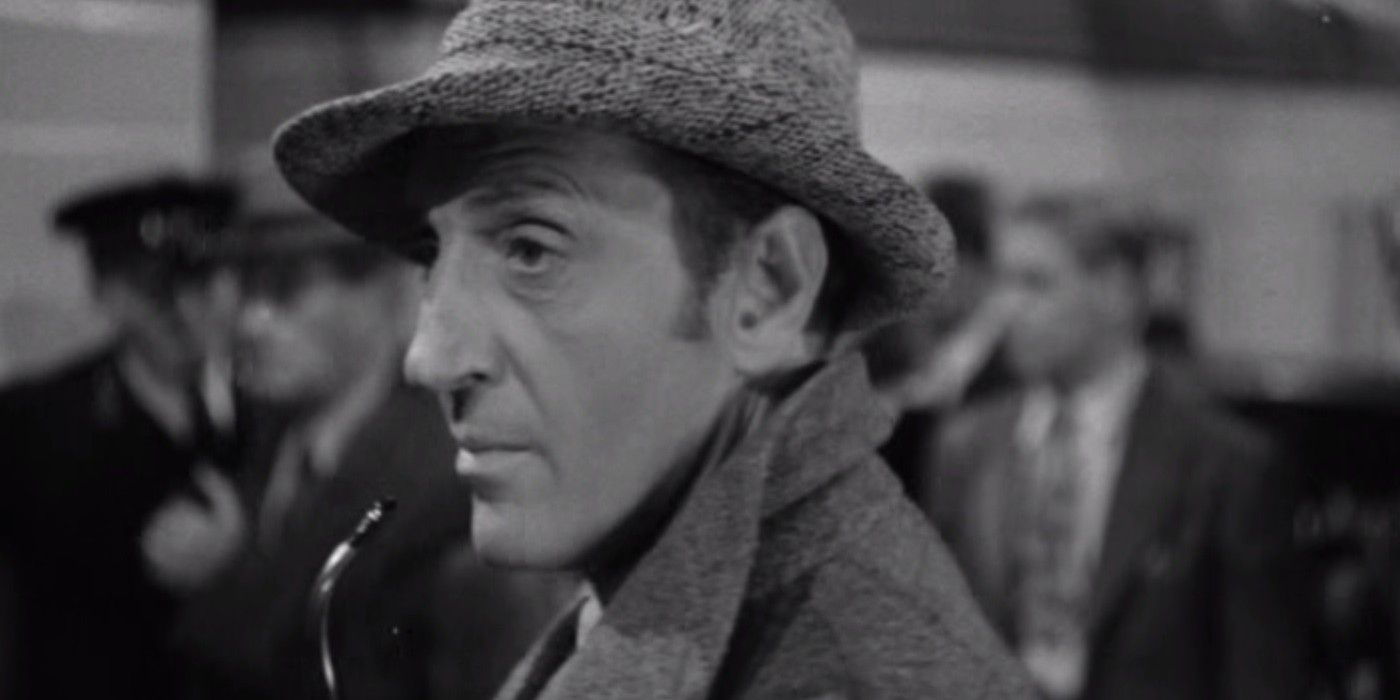 Sherlock Holmes with a pipe and deerskin hat in Terror by Night