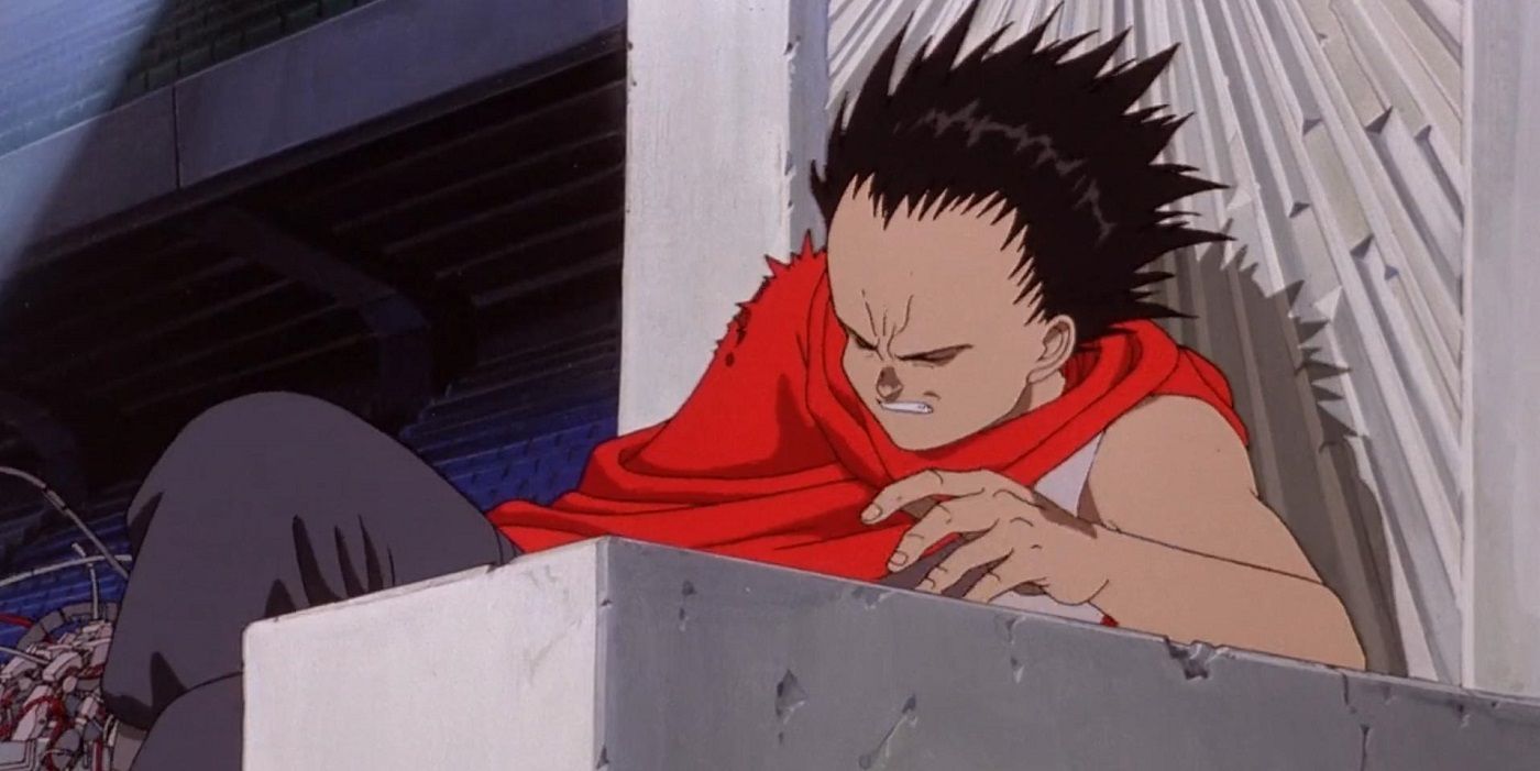 Tetsuo’s arm fused with the throne in Akira