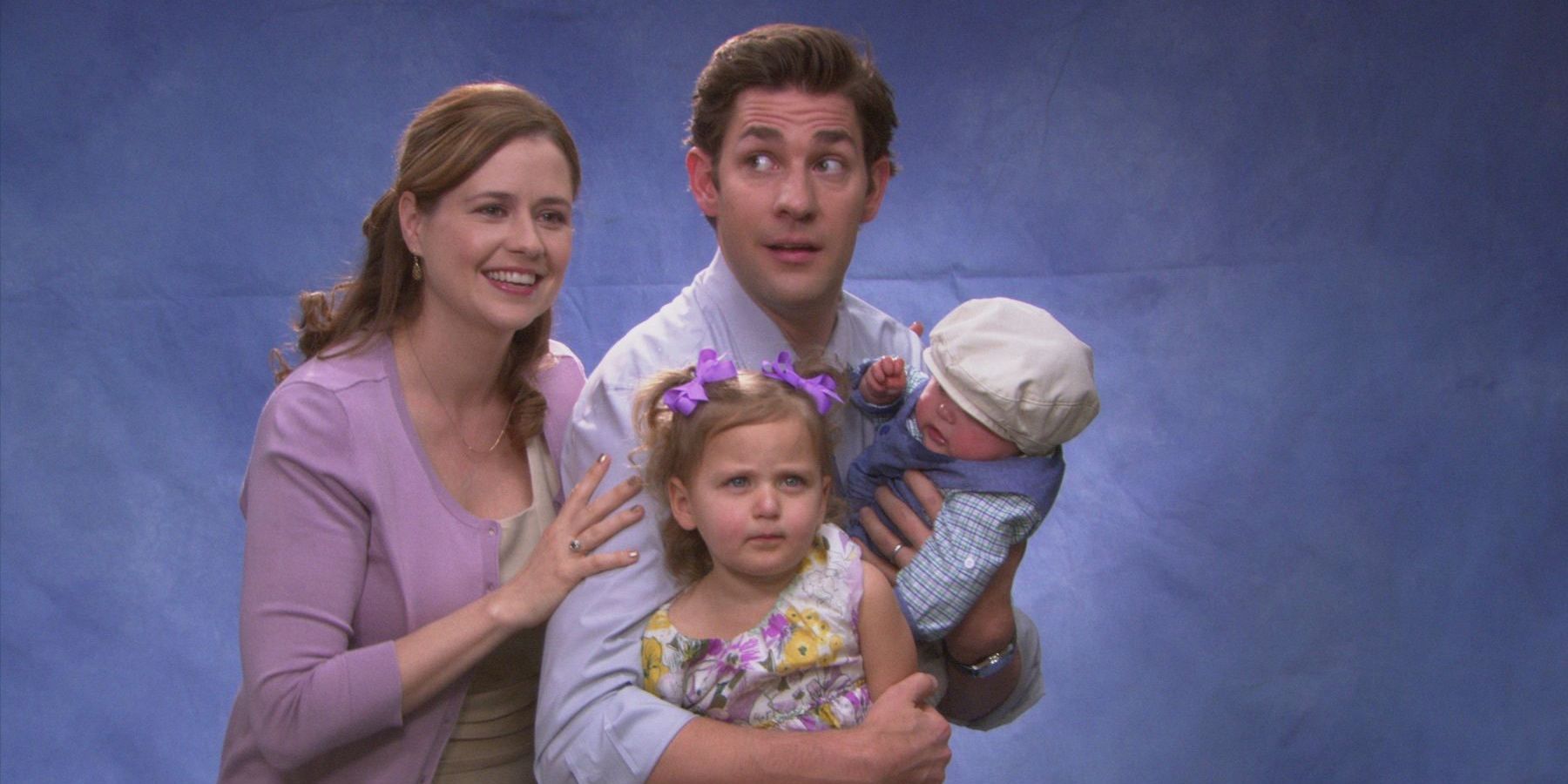 John Krasinski and Jenna Fischer and Jim and Pam Halpert taking a bizarre family picture with their two children