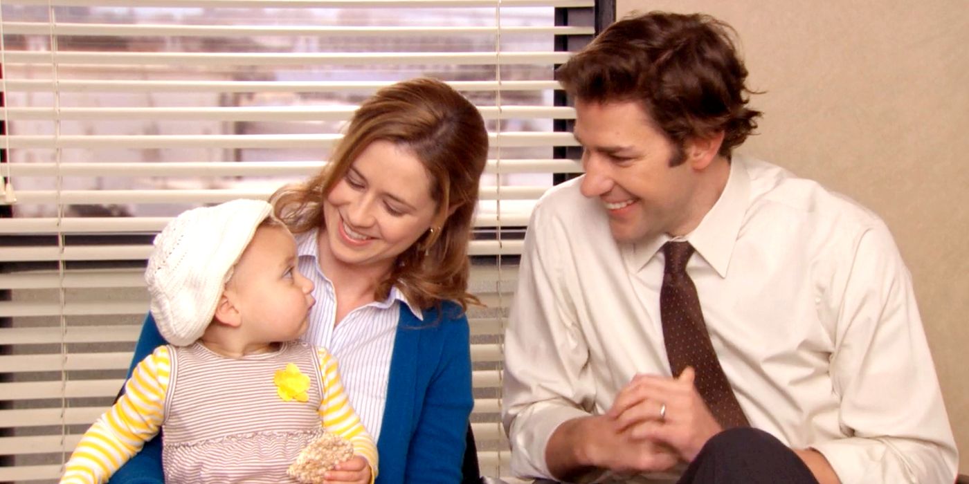 Jim and Pam smiling with baby Cece in The Office