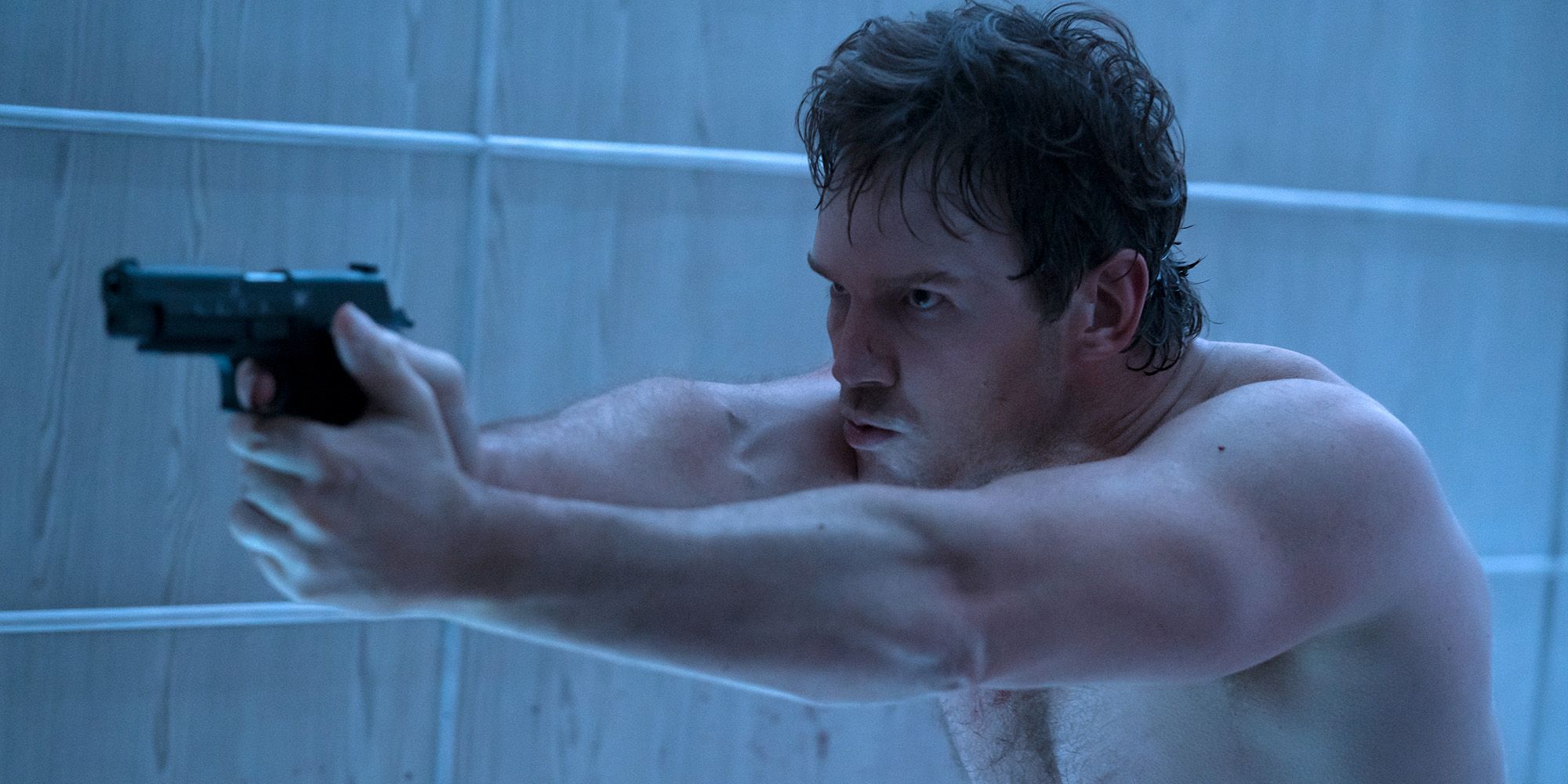 Chris Pratt in a bathtub with a gun in The Terminal List