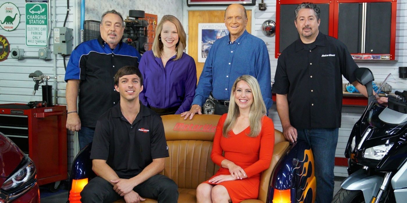The cast of the show MotorWeek posing for a photo.