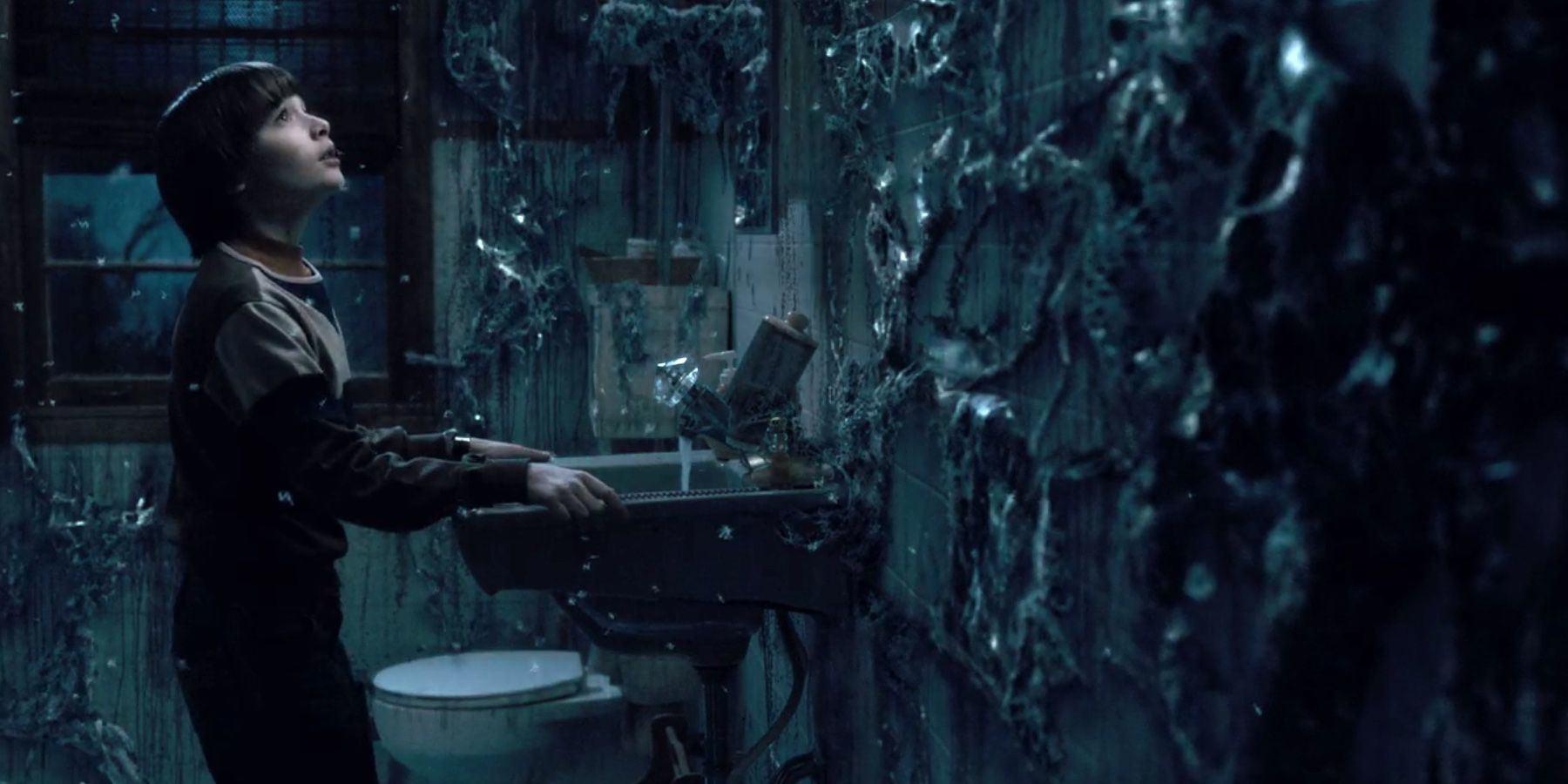 Will-looking-at-a-rotting-bathroom-in-Stranger-Things-Cropped-2