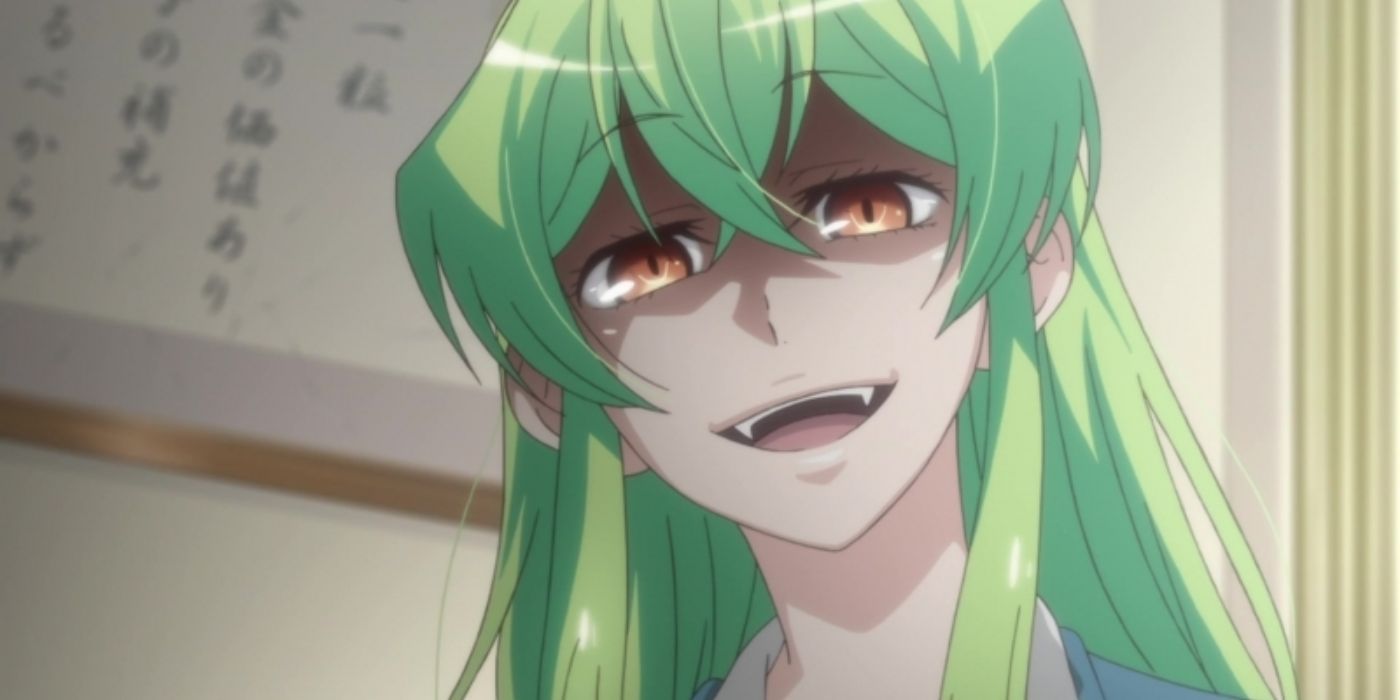 A close up image of Youko Shiragami showing her vampire teeth