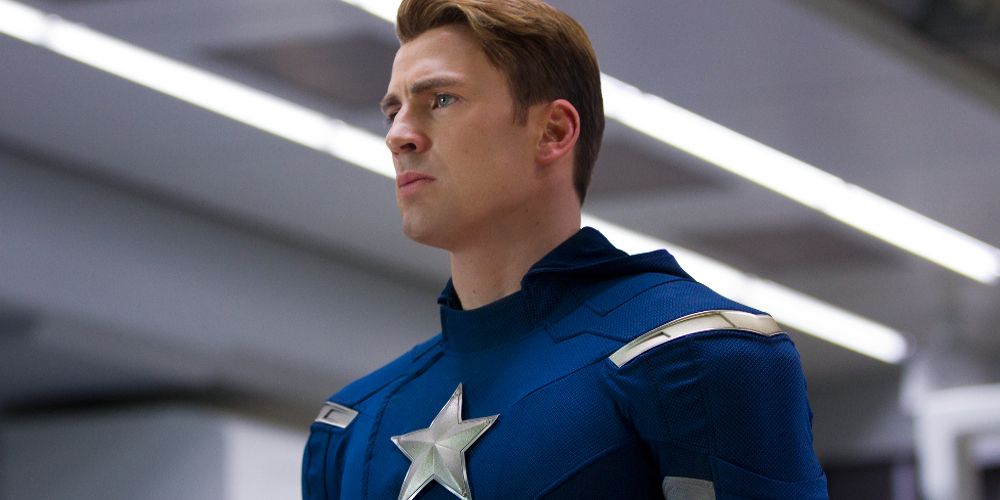 Steve stands under neon lights in his Captain America costume in The Avengers