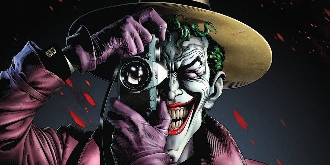 Joker laughing and taking a picture while looking through the camera lens