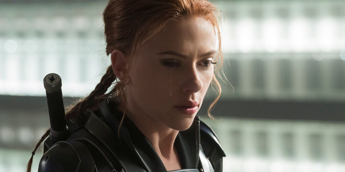 Black Widow looking down with a saddened expression