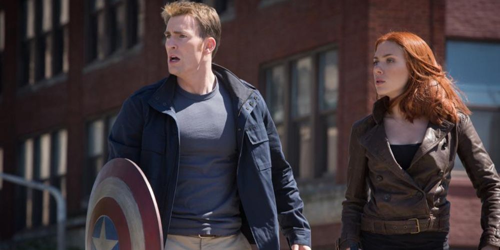 Steve and Natasha stand by a building in Captain America: The Winter Soldier