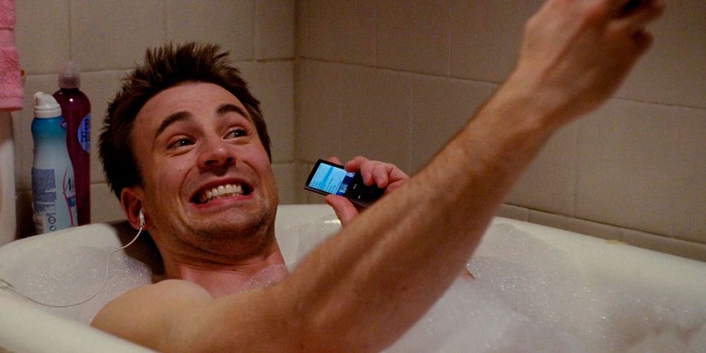 Colin holds a cell phone in the bathtub in What's Your Number?