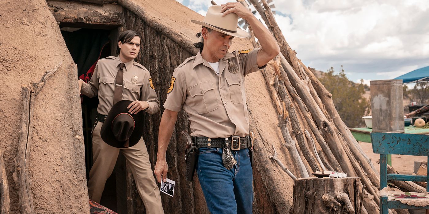 Zahn McClarnon and Kiowa Gordon walking in the open in Dark Winds