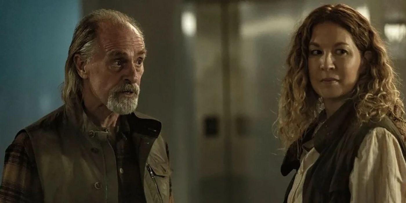 John Dorie Sr. and June standing beside one another, looking forward in a scene from Fear the Walking Dead.