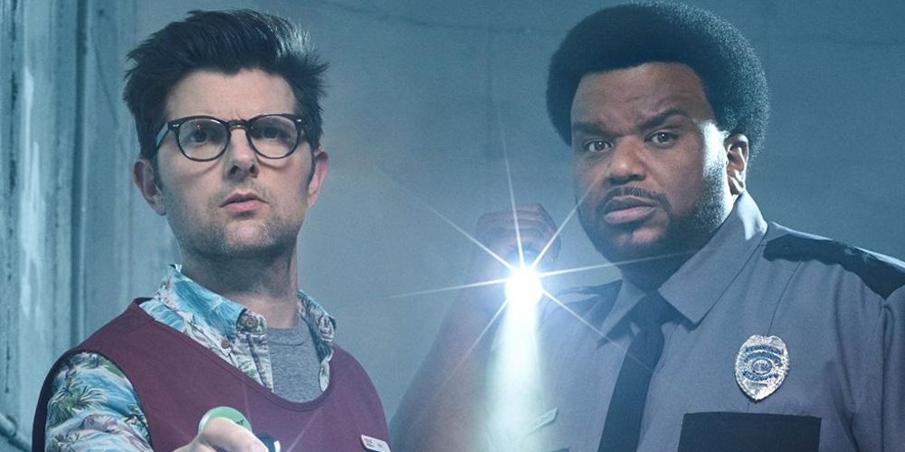 Max and Leroy shine flashlights in Ghosted