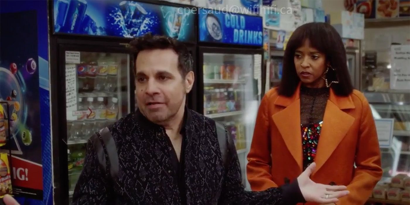 Mario Cantone and Wickie in a convenience store in a scene from Girls5eva.