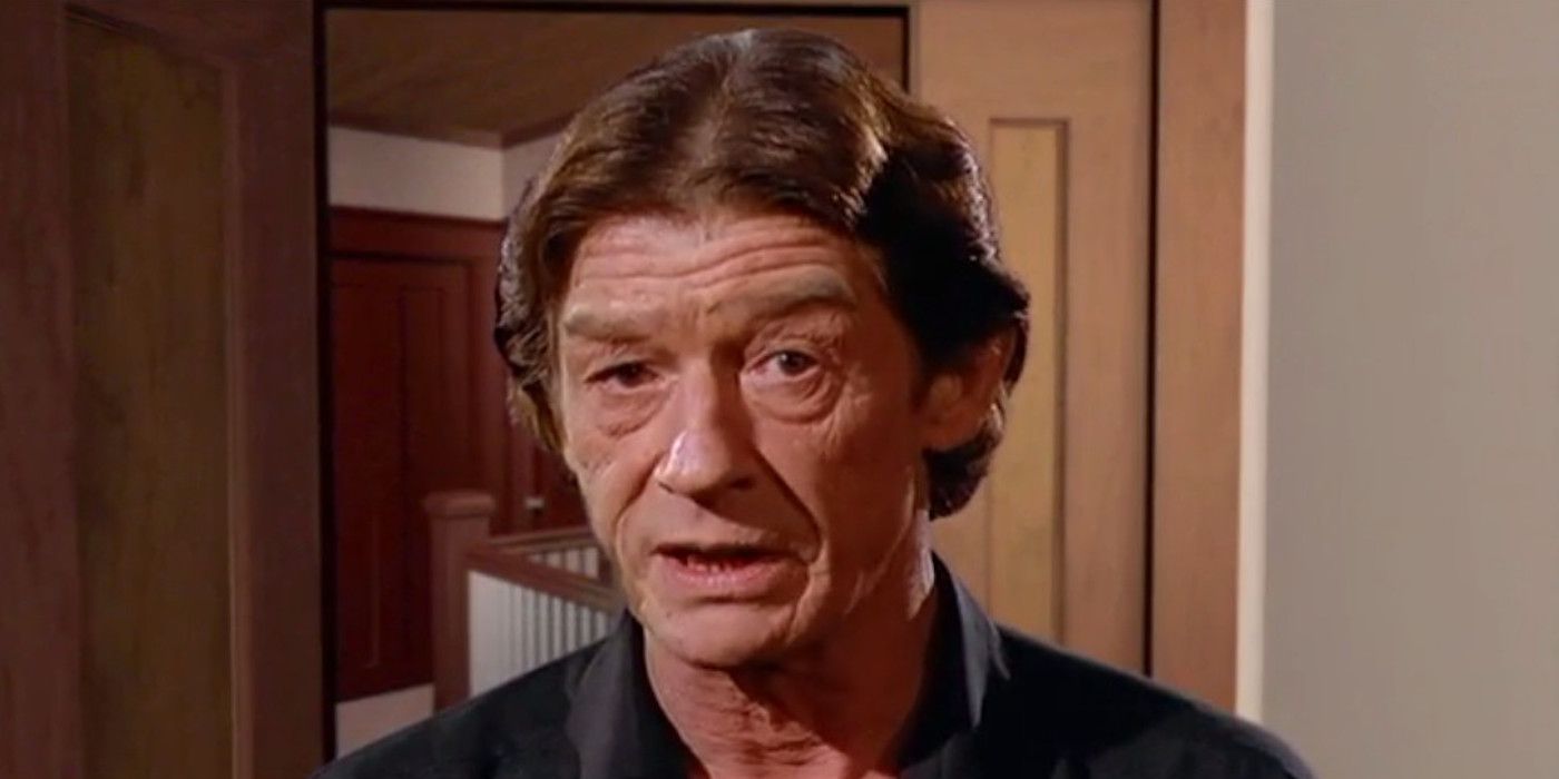 A screenshot of John Hurt as Dr. Turner in the FMV game Tender Loving Care