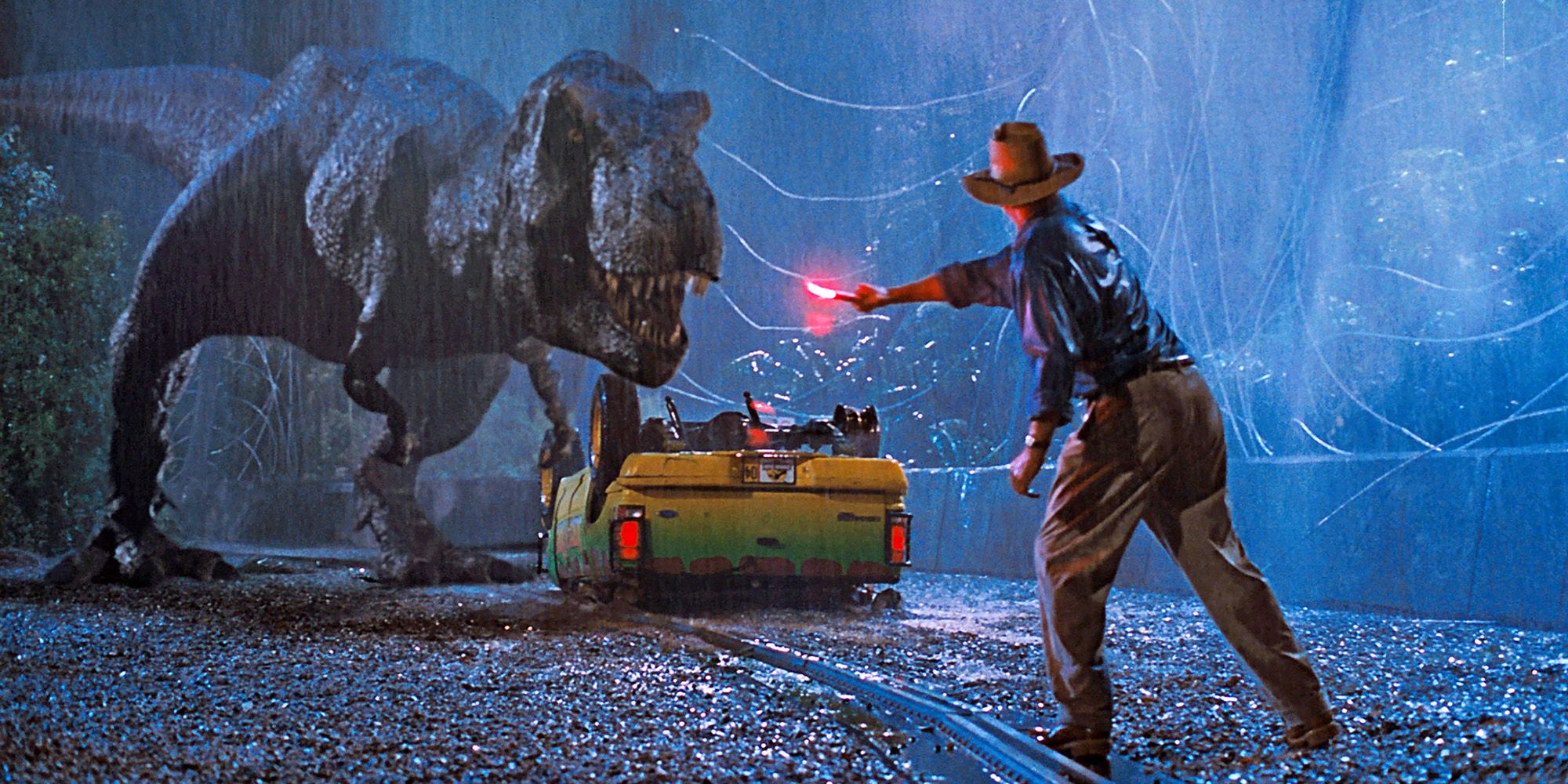 Alan Grant faces off against a T-rex in Jurassic Park