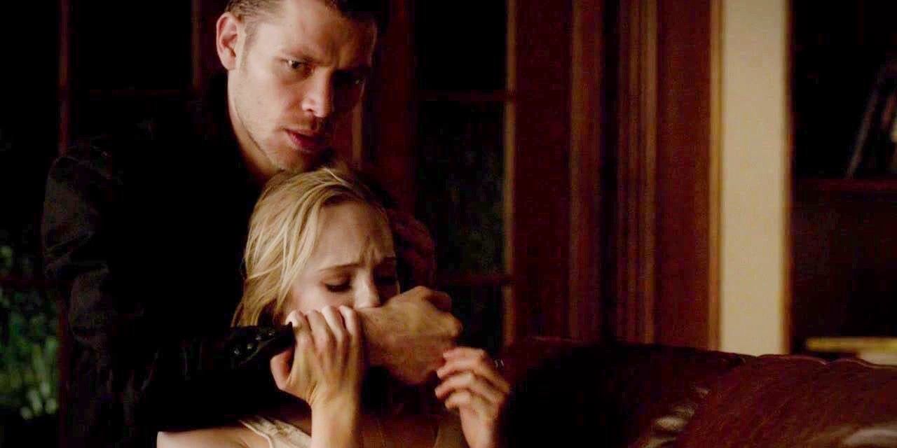 Klaus gives Caroline his blood in The Vampire Diaries