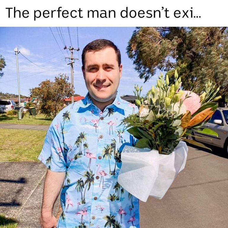 A photo of Michael from Love on the Spectrum holding flowers in a meme.