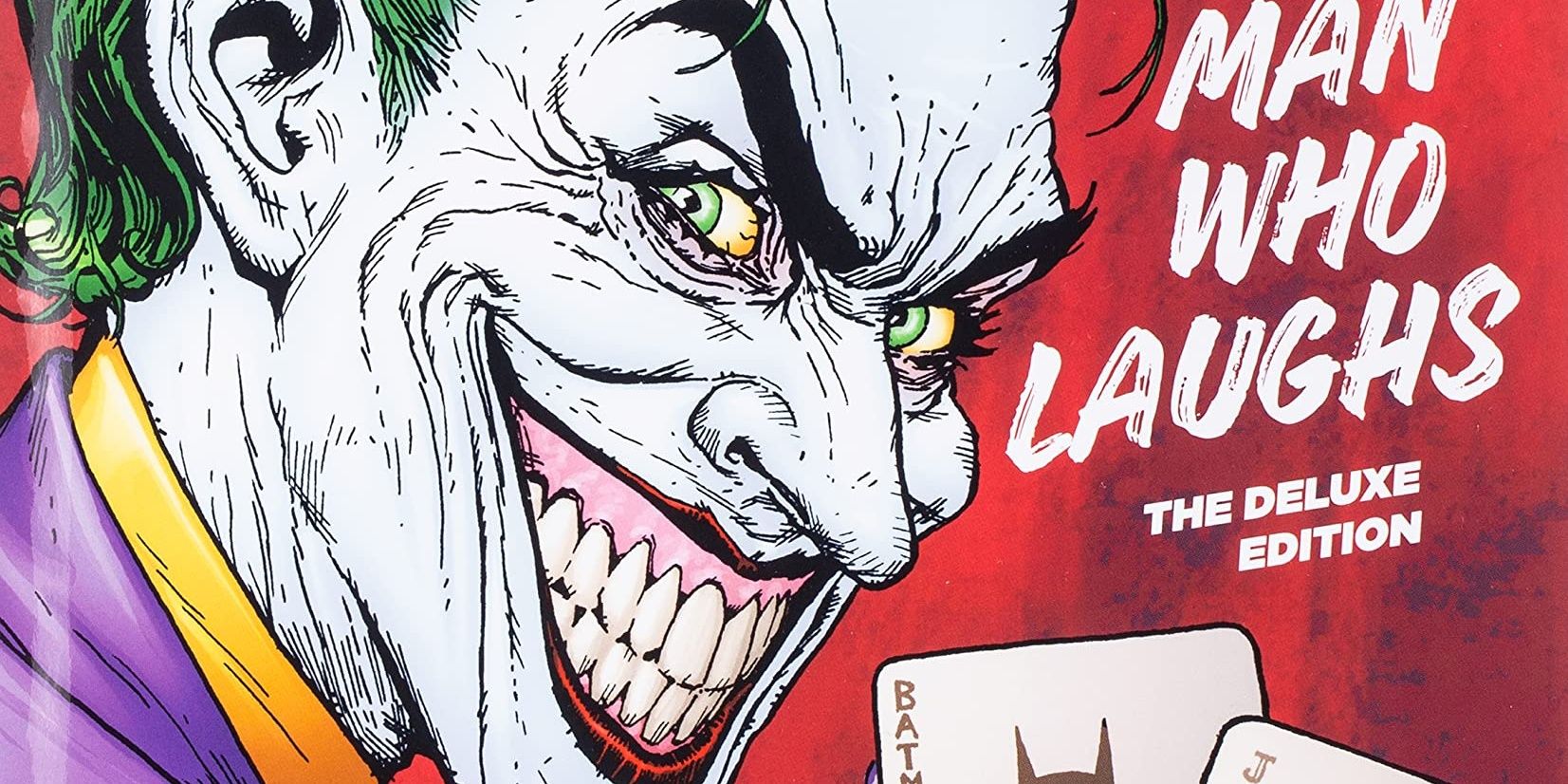 Joker laughing and holding up two cards