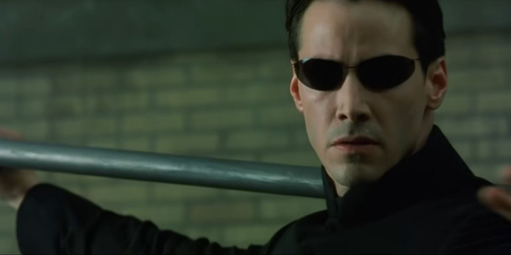 Neo wielding a metal pipe in The Matrix Reloaded