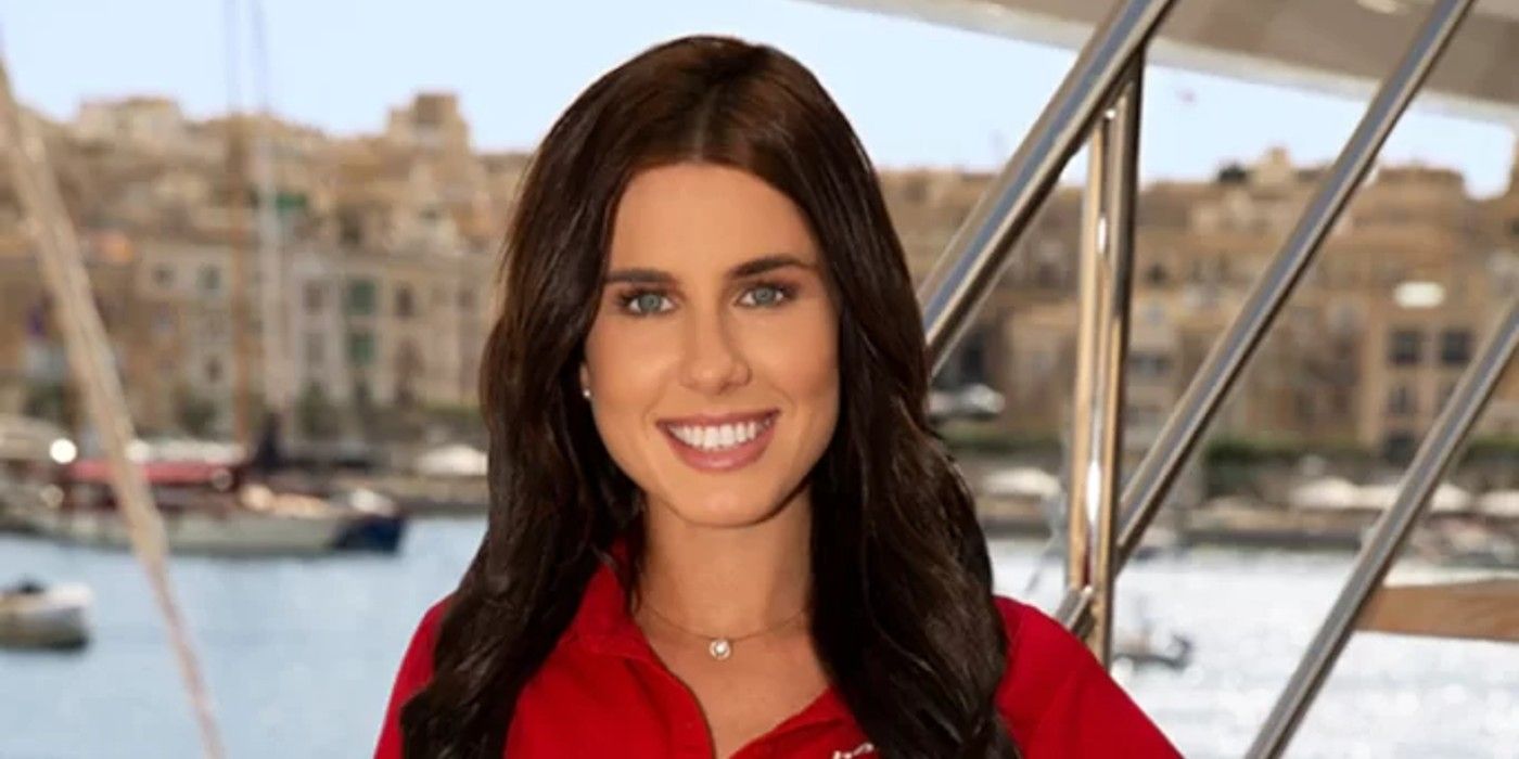 Natalya Scudder form Below Deck Med season 7 smiles for her promo shot wearing a red shirt