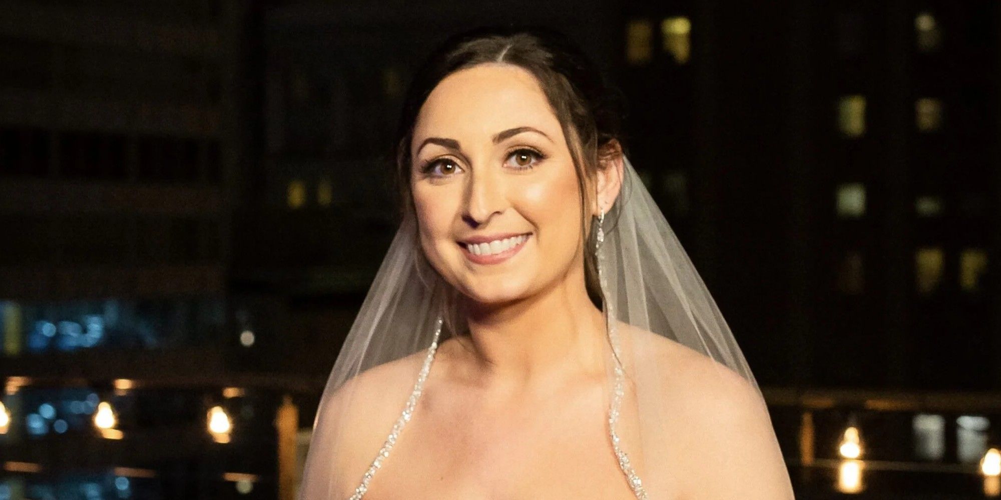 Olivia Cornu from Married At First Sight smiling during her wedding day.