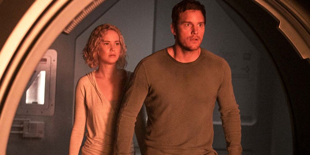 Aurora and Jim stand under an archway on the ship in Passengers