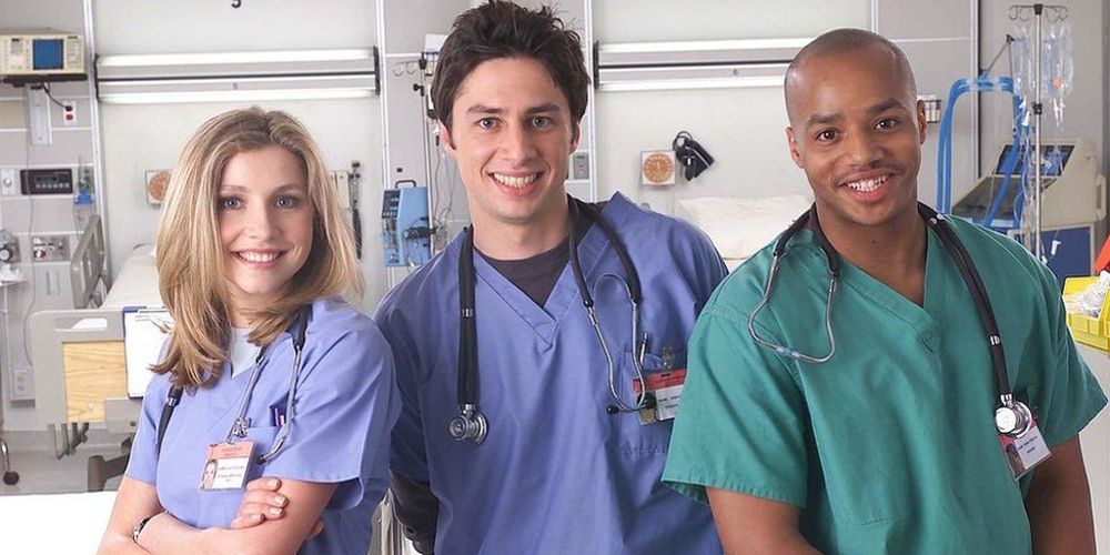 Elliot, JD, and Turk pose together in the hospital on Scrubs