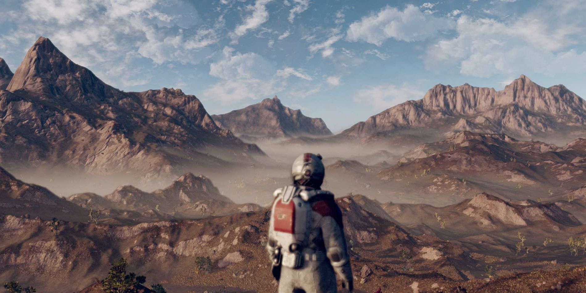 A character looking out onto a barren landscape in Starfield.