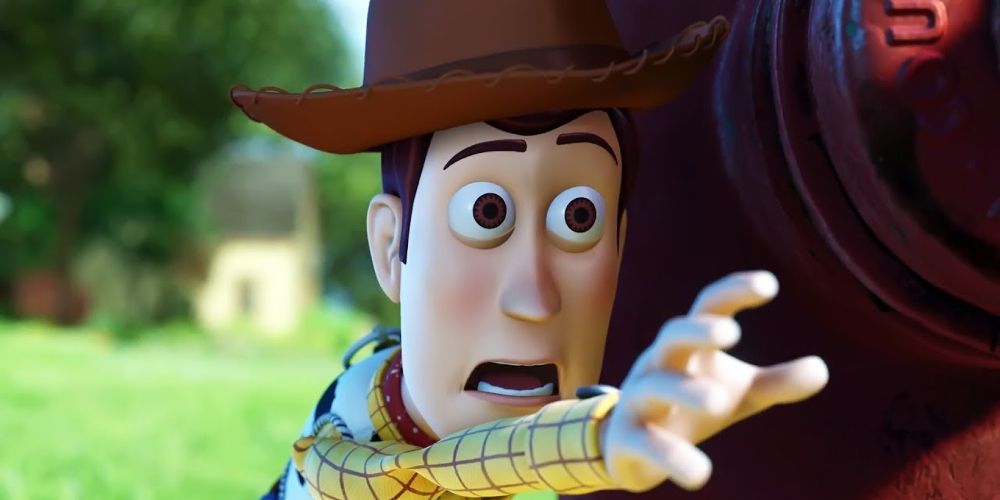 Woody stretches his arm out in Toy Story 3