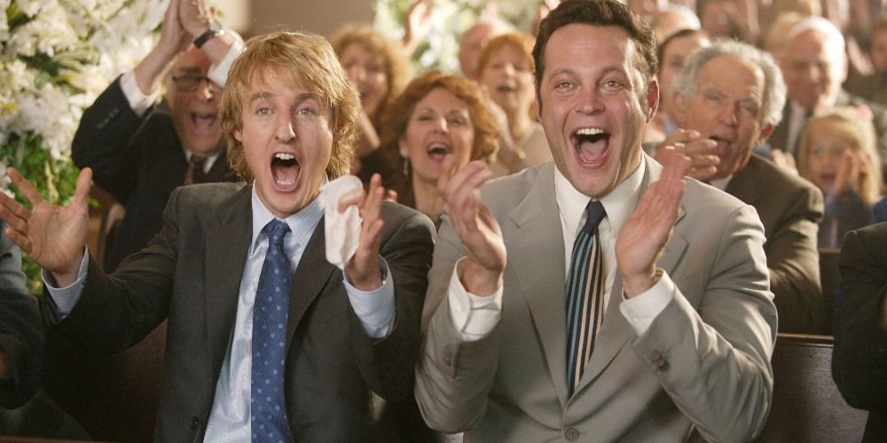 John and Jeremy rejoice in the pews in Wedding Crashers