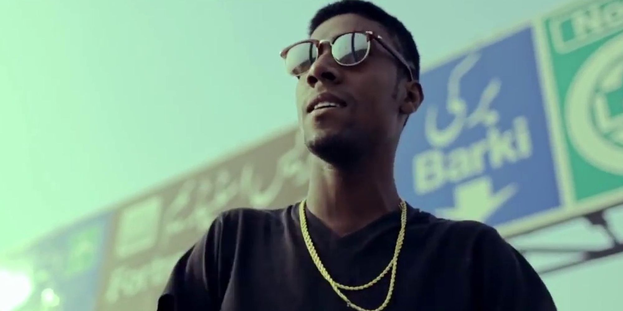 Abid Brohi looking upwards in the music video for The Sibbi Song Cropped (1)