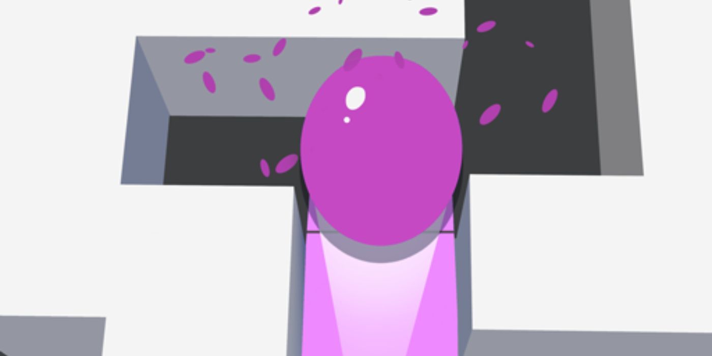 A purple ball going through a tunnel in the game Amaze.