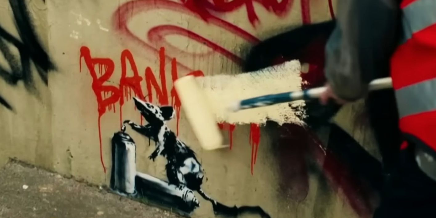 A Banksy artwork gets painted over