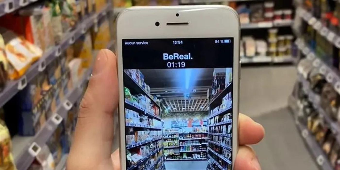 User taking their BeReal in a supermarket aisle