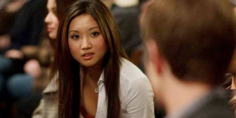 Christy looking at someone and smiling in The Social Network.