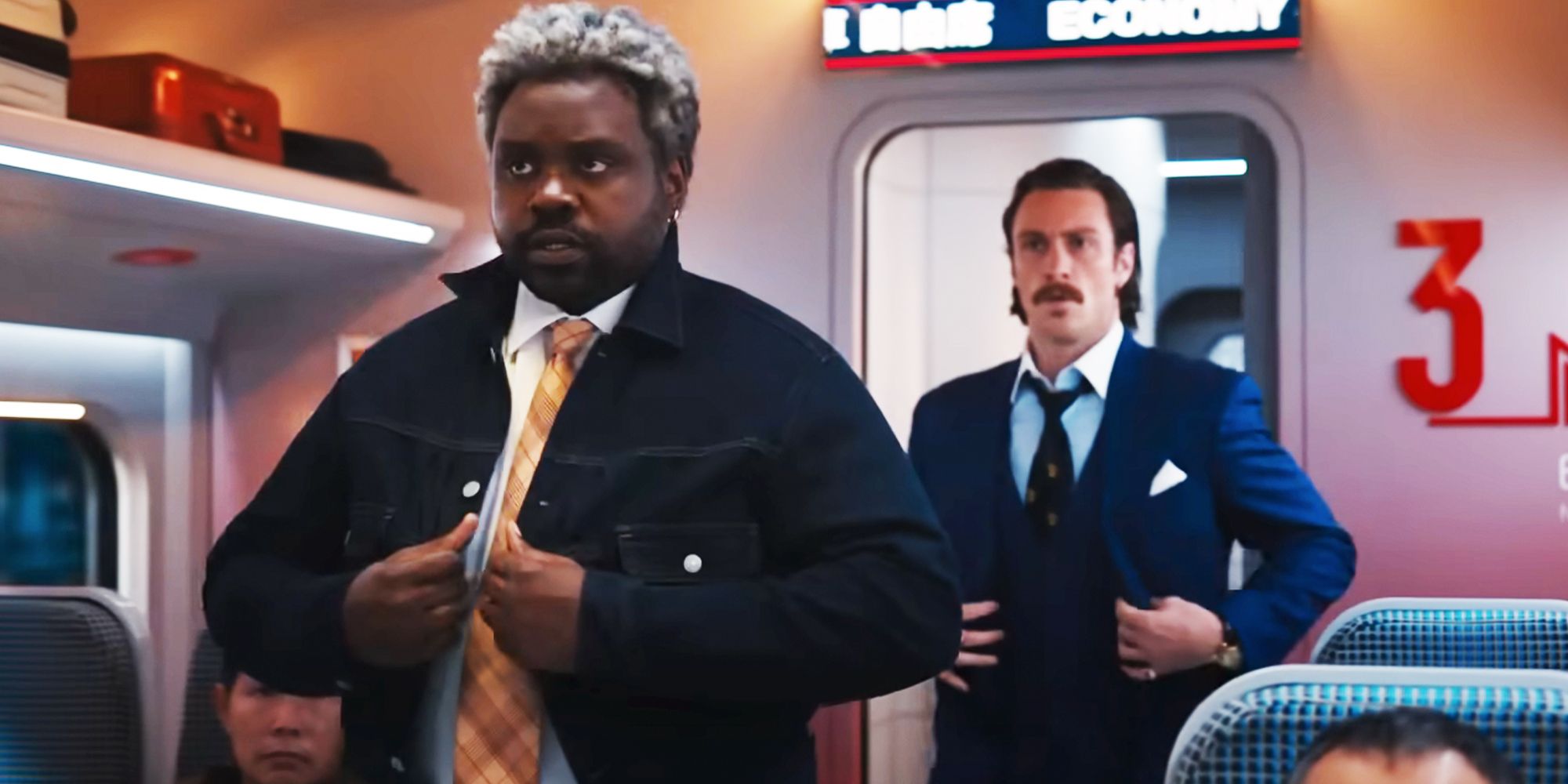 Brian Tyree Henry as Lemon and Aaron Taylor-Johnson as Tangerine in Bullet Train