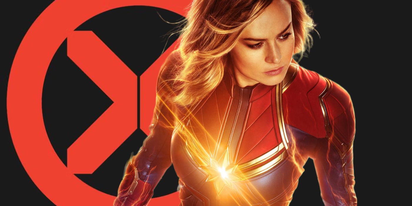 Captain Marvel stood in front of X-Men logo