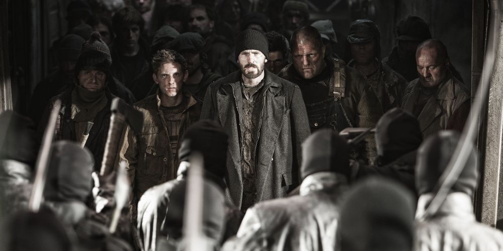 Chris Evans with a large group of supporters behind him in Snowpiercer