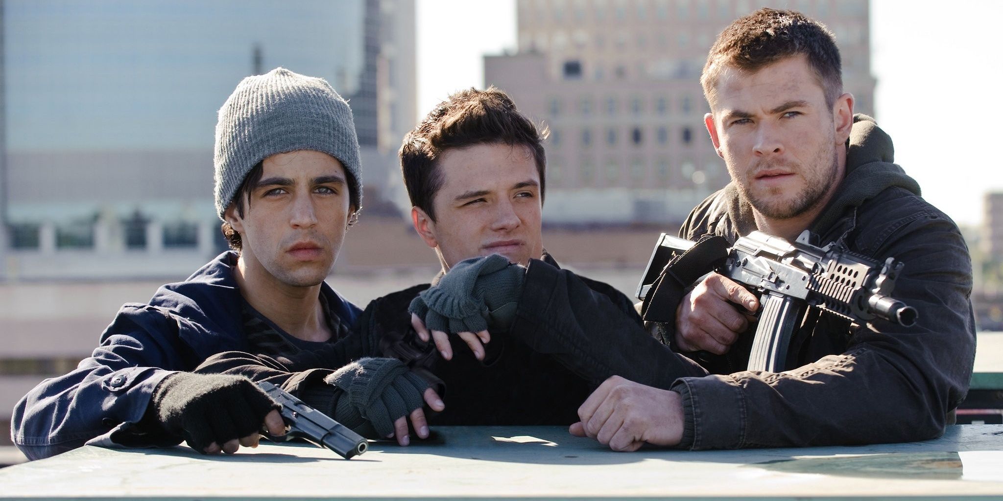 Chris Hemsworth and his friends on a rooftop in Red Dawn