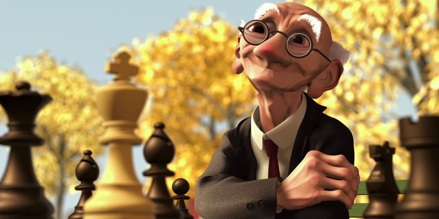 an elderly man smiles while playing a chess game