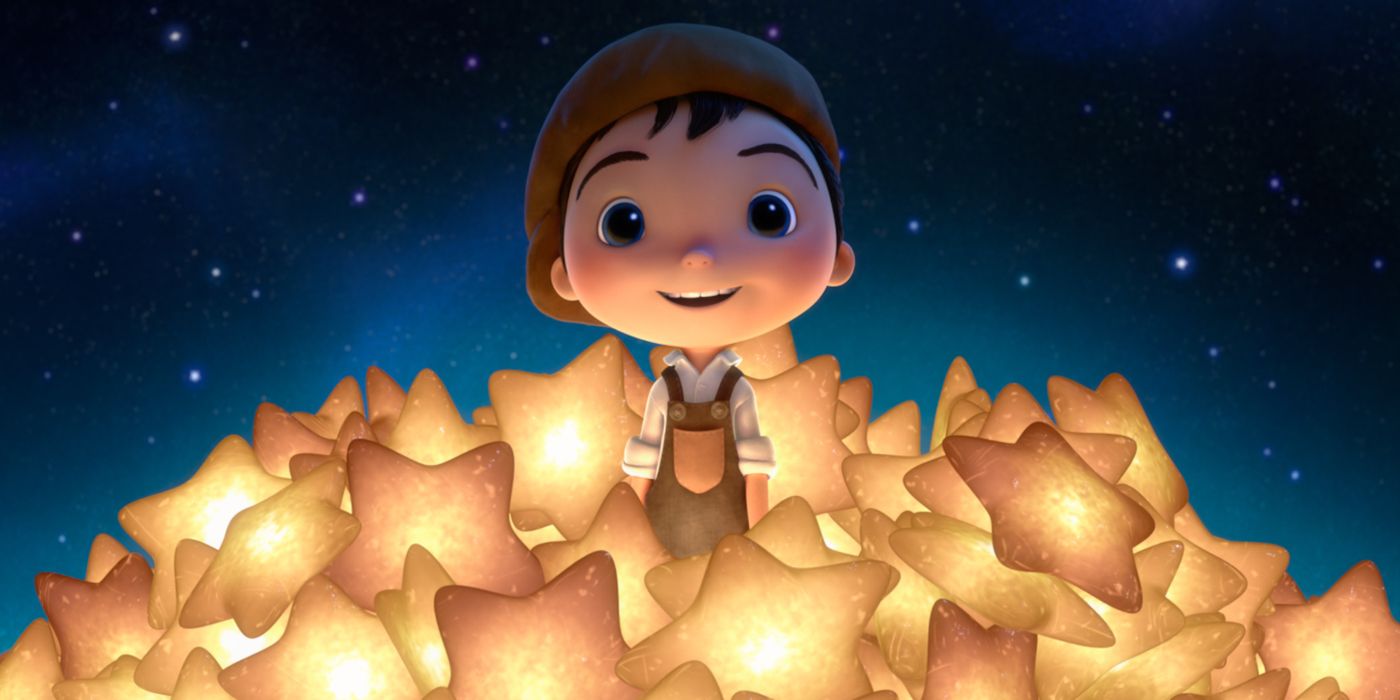 a young boy sits amongst a pile of stars