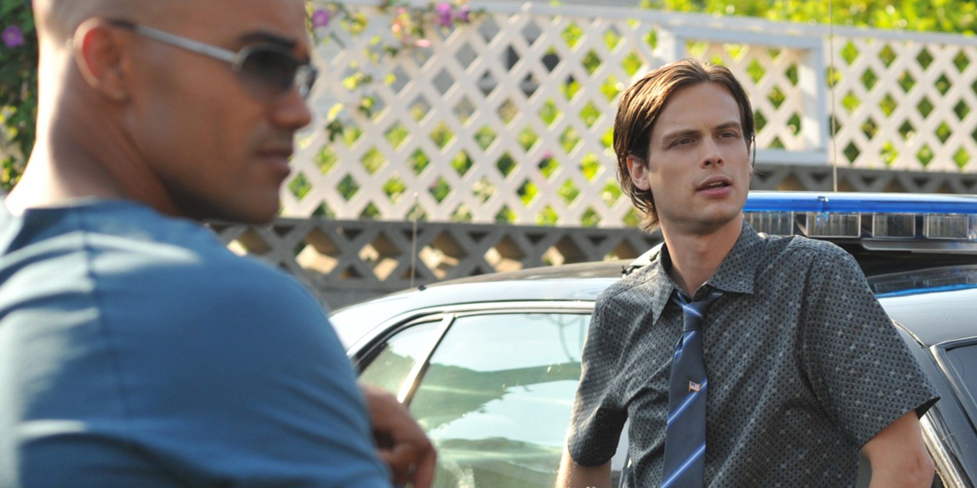Derek Morgan And Spencer Reid Stood Infront Of Car
