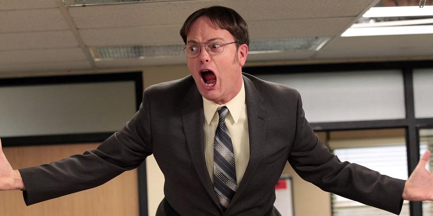 Dwight screaming on top of his desk