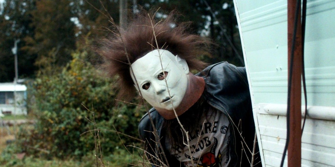 Eddie Munson wearing a Michael Myers mask in Stranger Things season 4