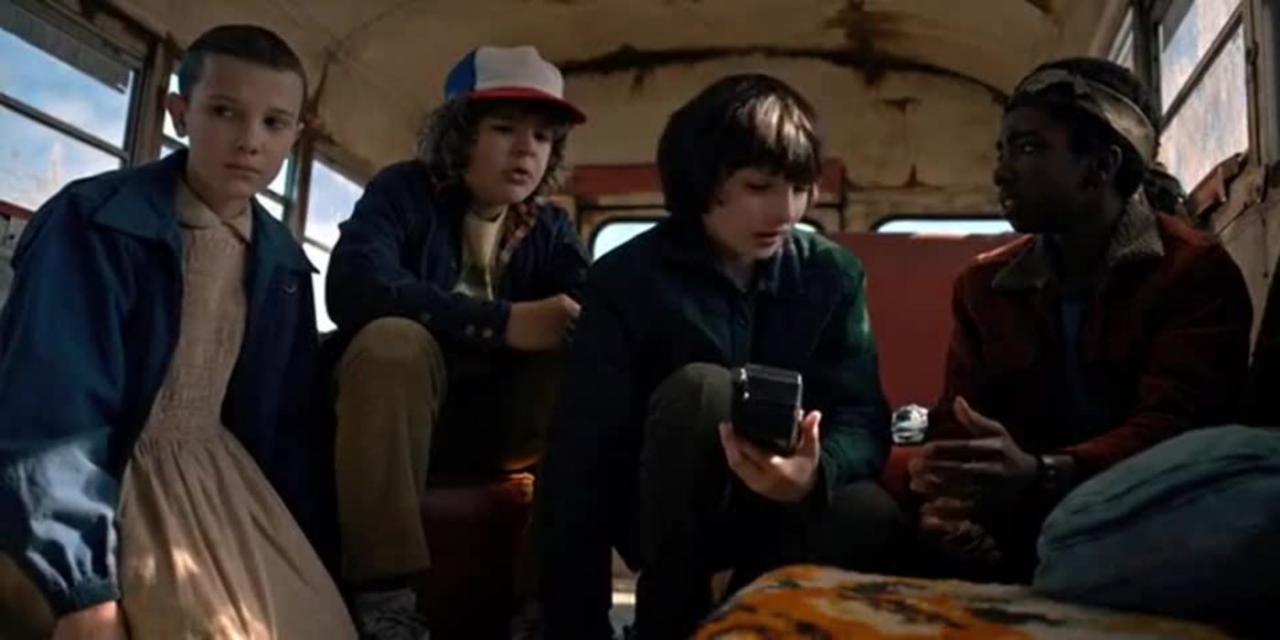 El, Dustin, Mike, and Lucas hide on a bus in Stranger Things