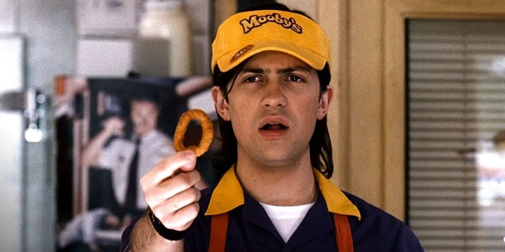 Elias with an onion ring in Clerks II