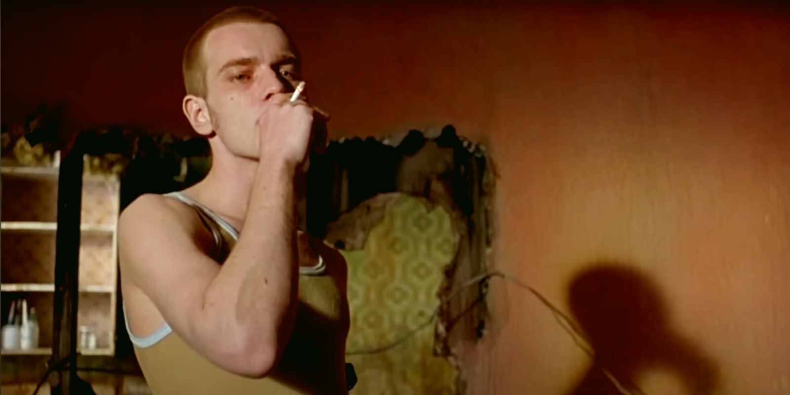 Mark from Trainspotting smoking a cigarette