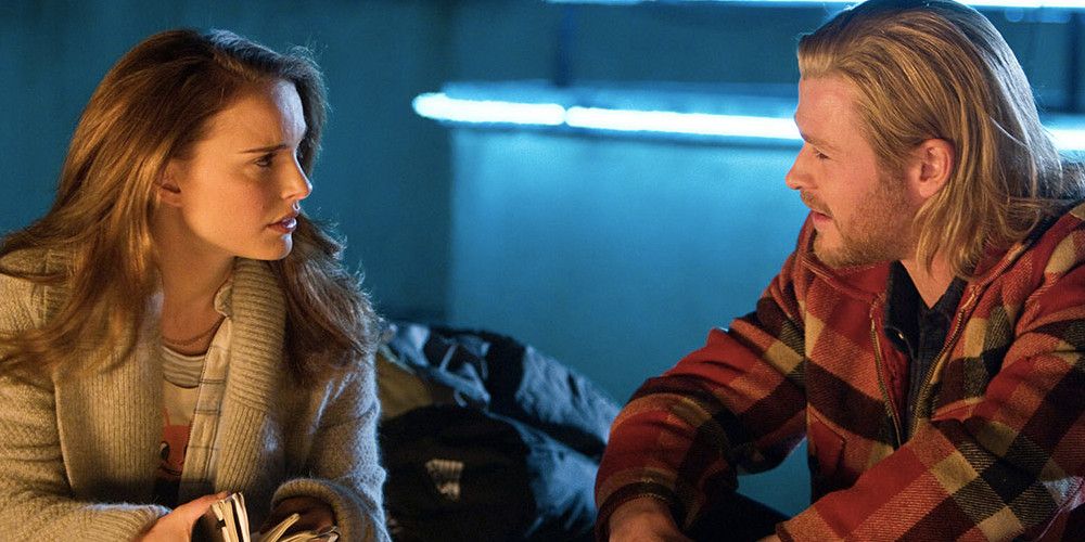 Jane Foster and Thor talking by the campfire in Thor