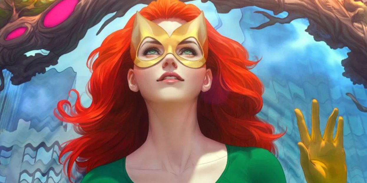 Jean Grey in her classic Marvel Girl costume, looking up.